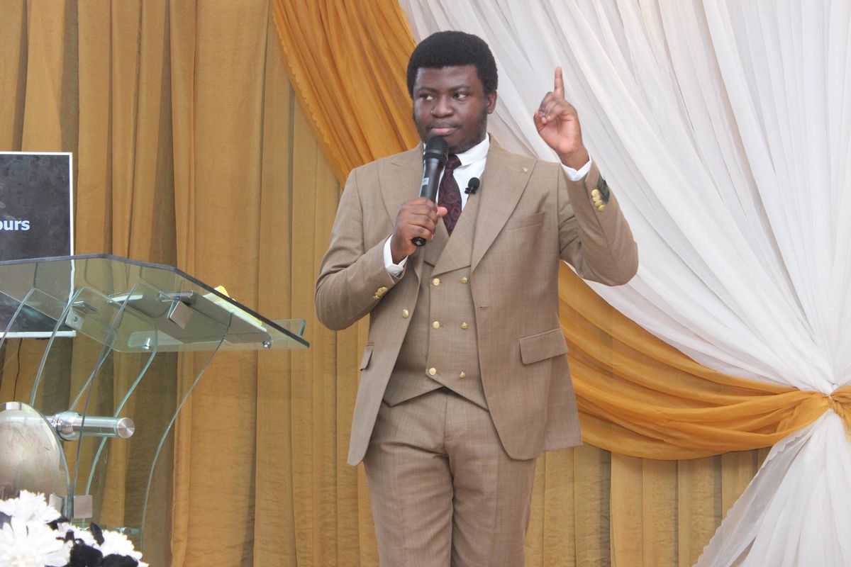A minister preaching the Word from the pulpit